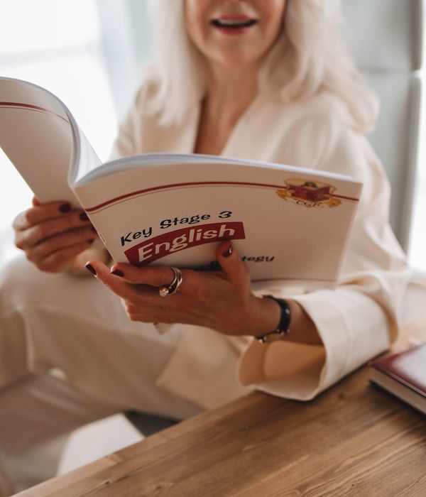 English textbooks and learning materials arranged on study desk