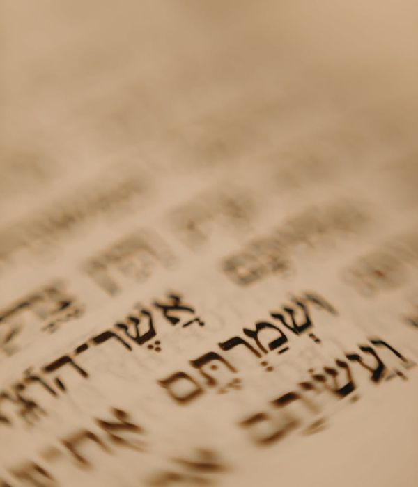 Hebrew alphabet with traditional calligraphy and ancient manuscripts